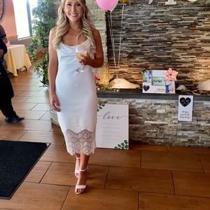 White bridal shower or rehearsal dress! Size XS but runs large